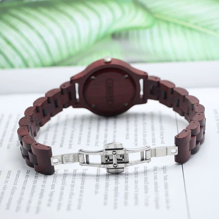 Genuine Wood Watches * Timepiece made of purpleheart wood * MOP dial with colorful diamond index * Certified with CE&RoHS standard * Case: 36mm Strap: 14mm
